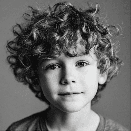 Kiểu tóc đẹp cho bé trai 11-13 tuổi: Curly Fringe